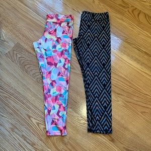 Two pairs of leggings, Never worn, size 14, 8$ separate and 15$ together.